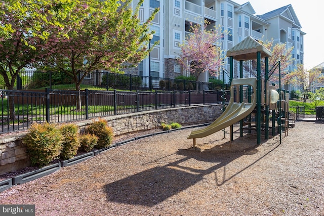 community jungle gym with fence