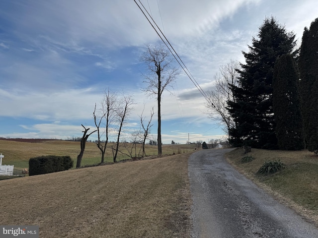 view of street featuring a rural view