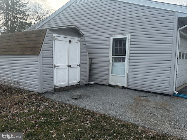 view of shed featuring a garage