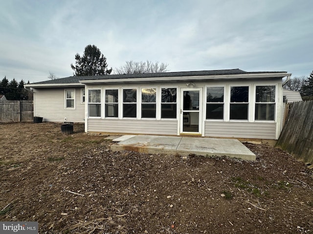 back of house featuring fence and a patio