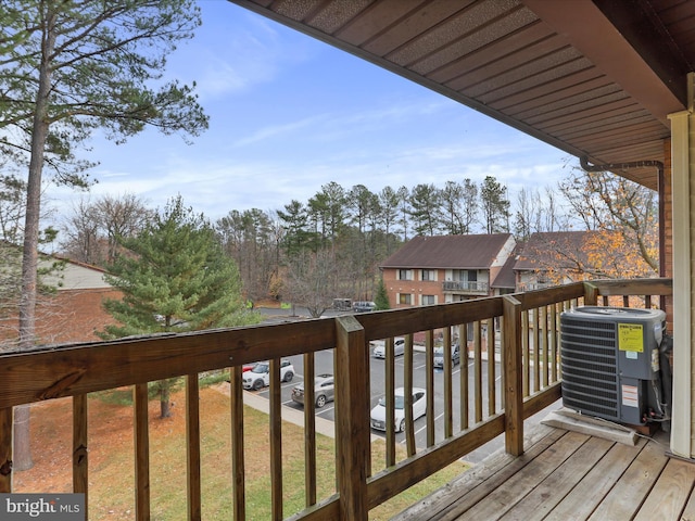 wooden terrace featuring central AC