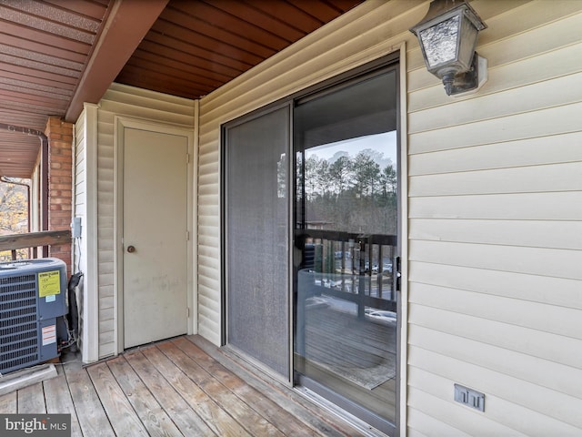 wooden deck with central AC unit