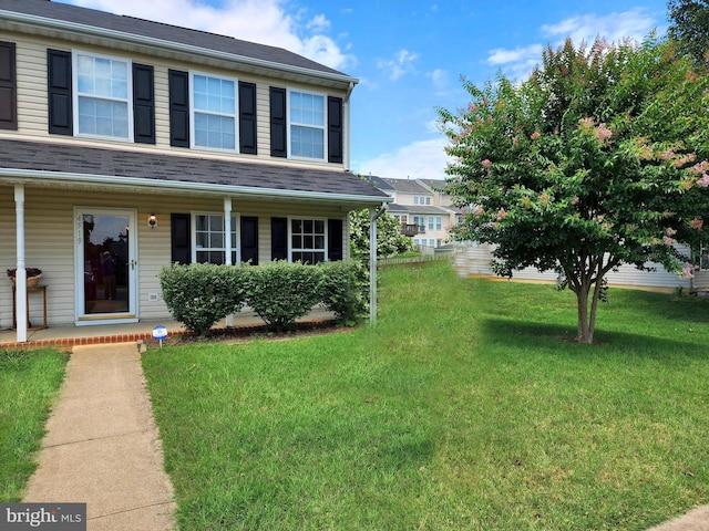 view of front of house featuring a front lawn