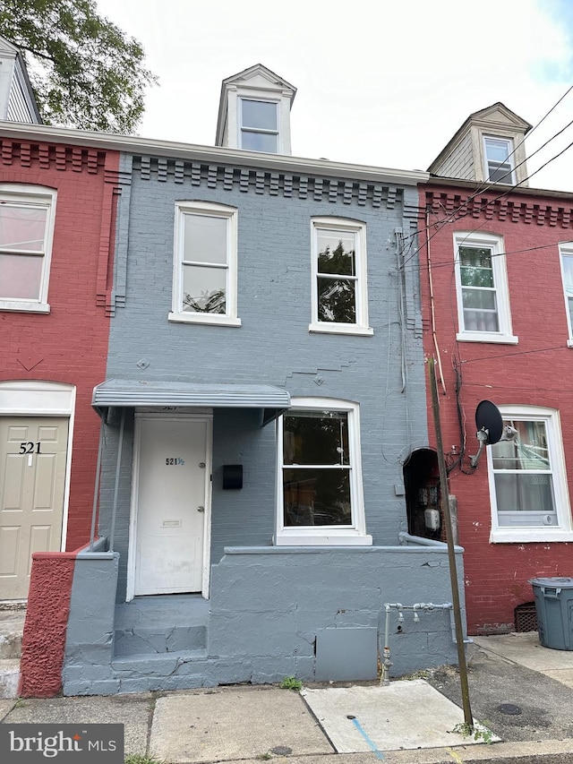 multi unit property featuring brick siding