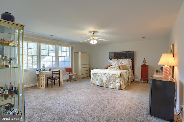 bedroom featuring carpet, ceiling fan, and baseboards