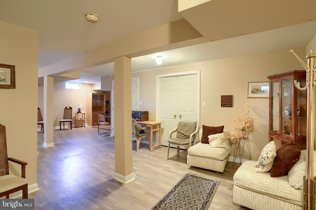 interior space with light wood-type flooring and baseboards