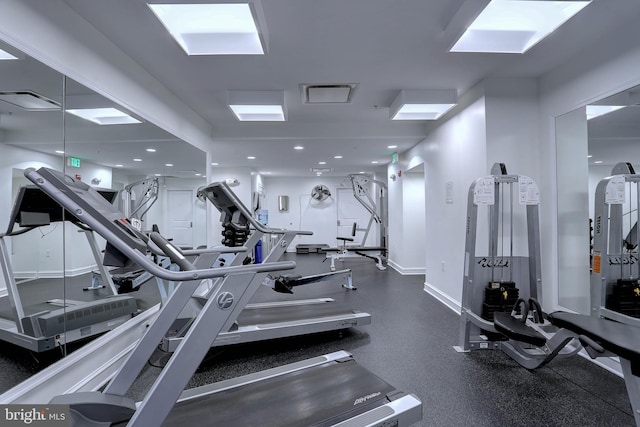 workout area featuring visible vents and baseboards