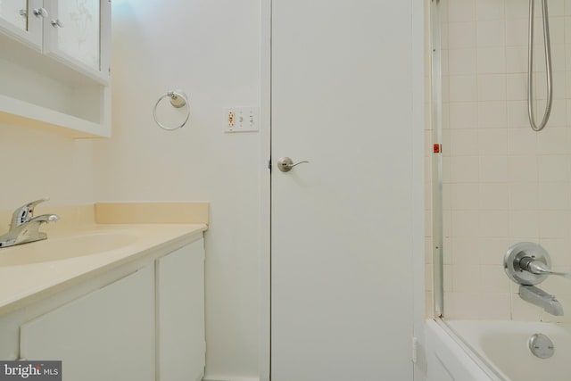 full bath featuring bathtub / shower combination and vanity