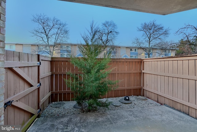 view of yard with a gate and fence