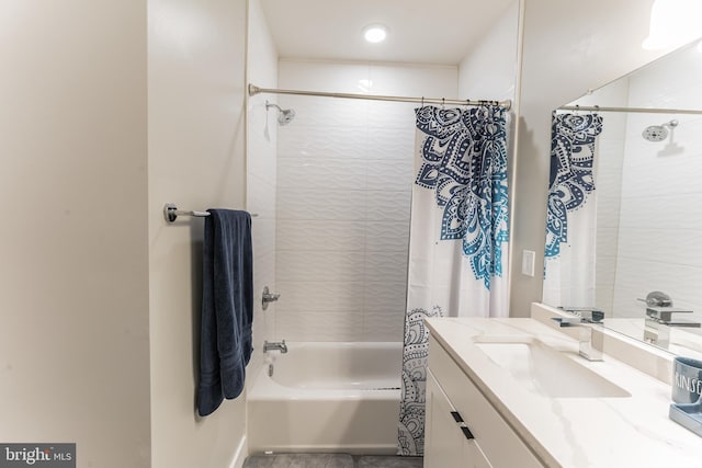 full bathroom featuring shower / bath combo and vanity