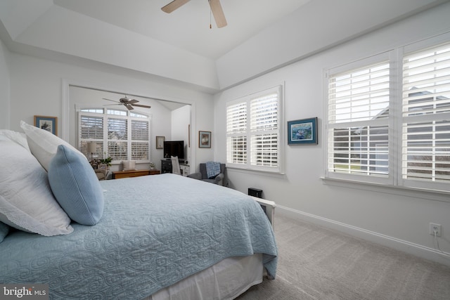 carpeted bedroom featuring a ceiling fan and baseboards