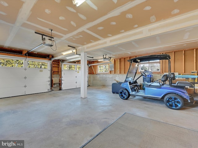 garage featuring a garage door opener