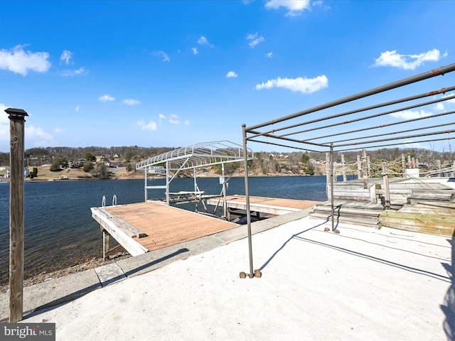 dock area with a water view