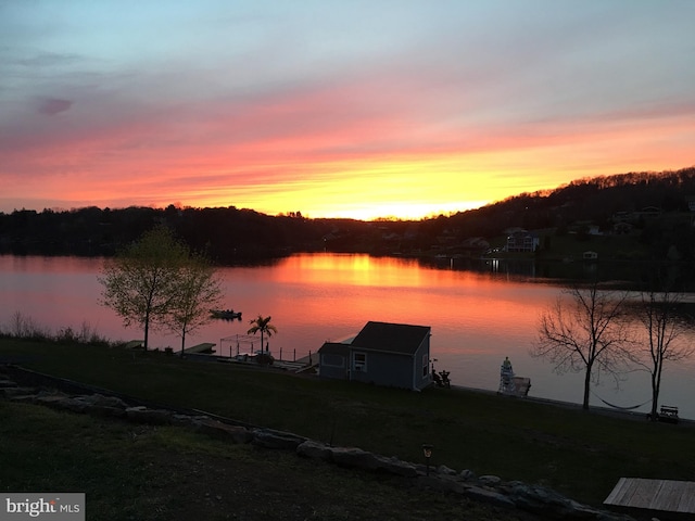 water view featuring a dock