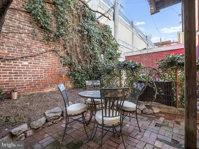 view of patio / terrace with fence and outdoor dining area