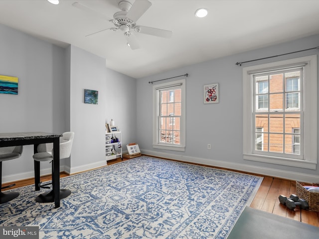 office area with recessed lighting, baseboards, ceiling fan, and hardwood / wood-style floors