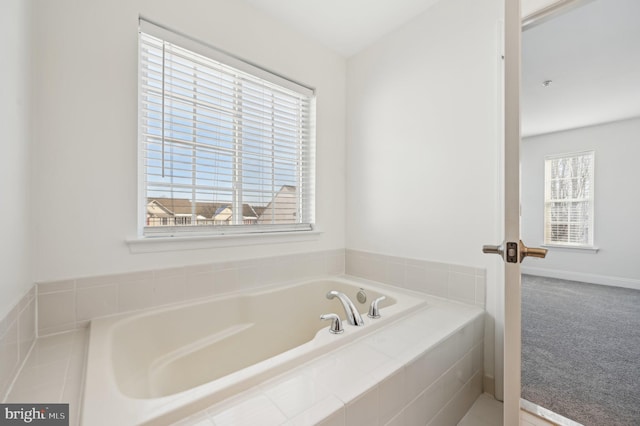 bathroom with a garden tub