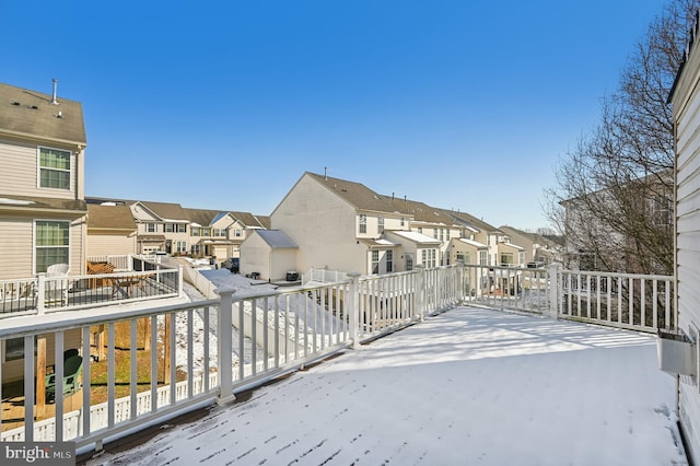 wooden terrace featuring a residential view