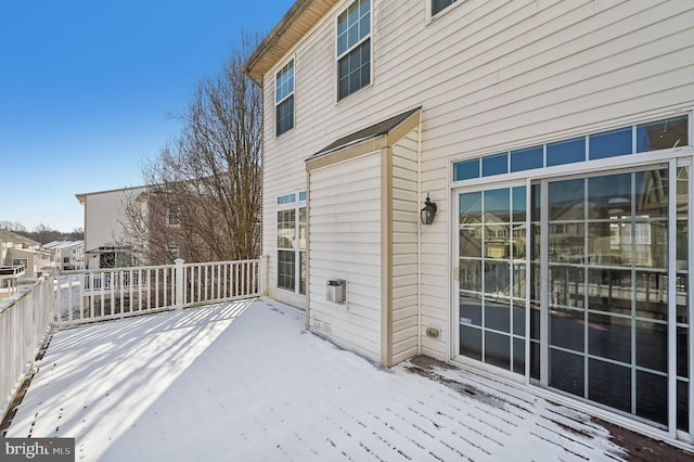 view of snow covered deck