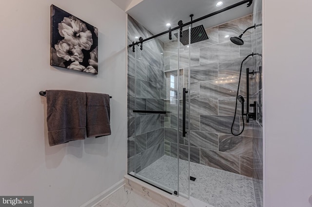 full bathroom featuring marble finish floor, recessed lighting, baseboards, and a stall shower