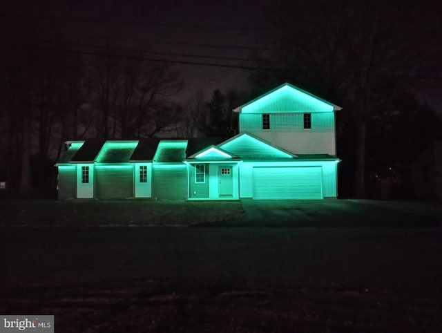 view of front of property featuring a garage