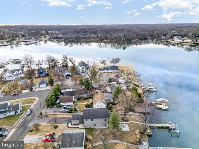 birds eye view of property featuring a water view