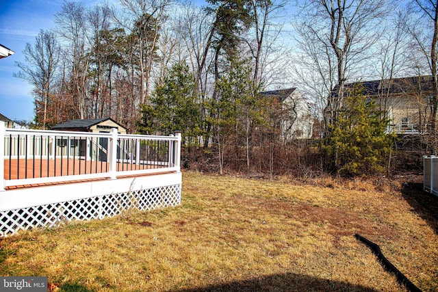 view of yard with a deck