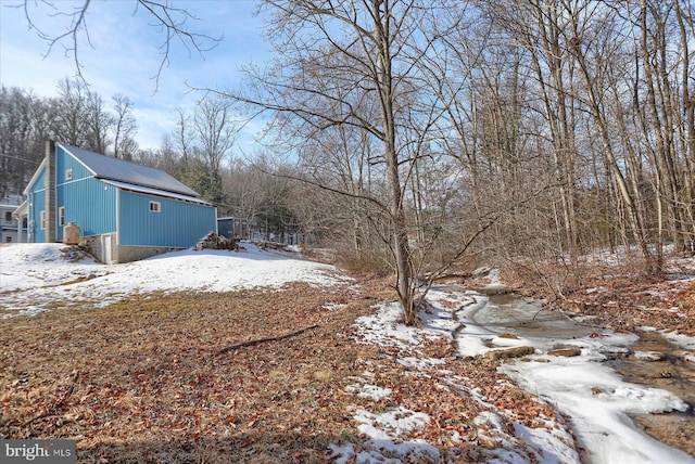 view of snowy yard