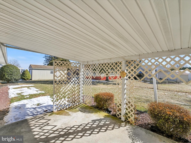 view of patio / terrace featuring fence