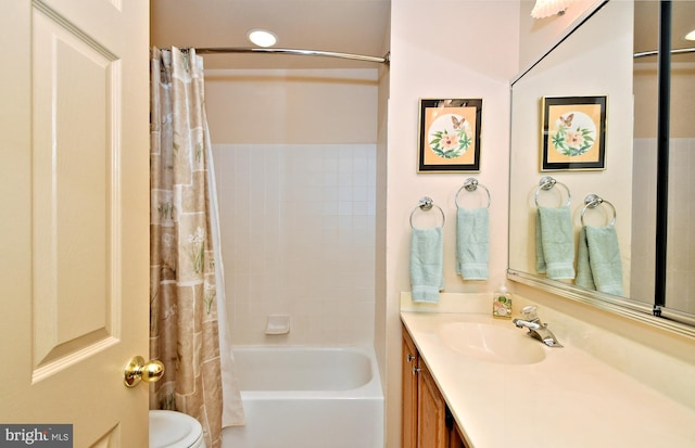 bathroom featuring toilet, vanity, and shower / bathtub combination with curtain