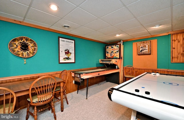 playroom with carpet floors, visible vents, and a drop ceiling