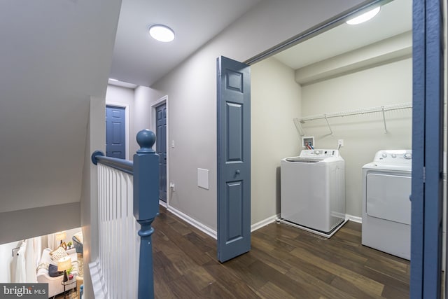 laundry room with washer and dryer, laundry area, dark wood finished floors, and baseboards