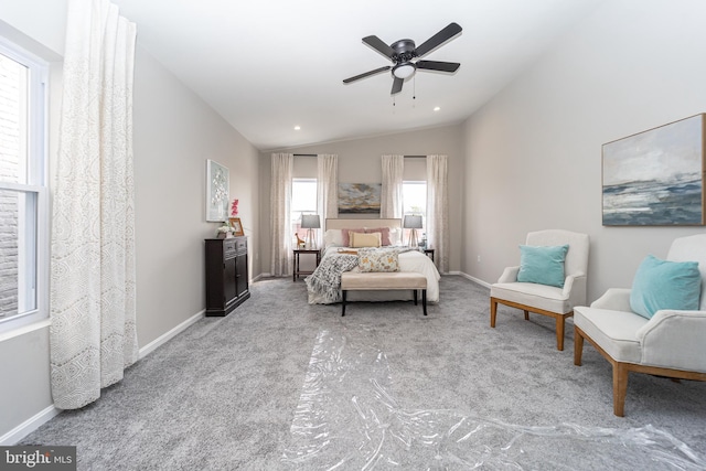 bedroom with light carpet, vaulted ceiling, recessed lighting, and baseboards