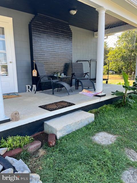 view of patio featuring a fire pit