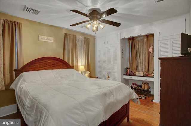 17035 Virginia Ave, Williamsport, MD 21795 - bedroom with visible vents, ceiling fan, a closet, and wood finished floors
