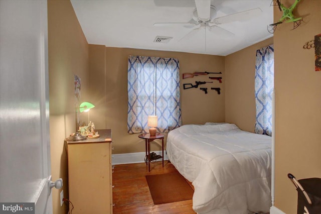 17035 Virginia Ave, Williamsport, MD 21795 - bedroom with ceiling fan, visible vents, baseboards, and wood finished floors