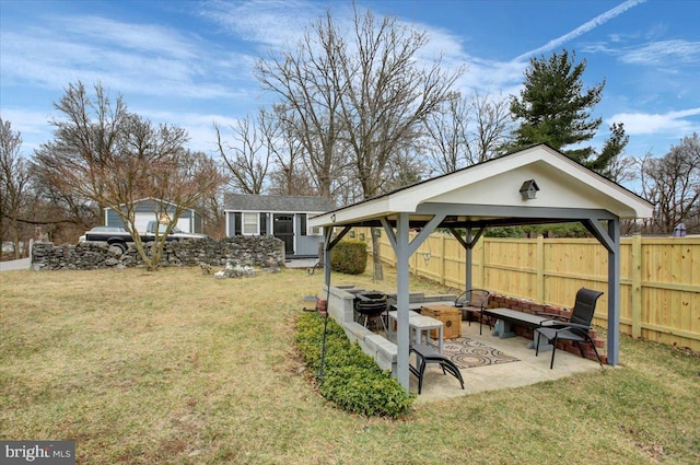 17035 Virginia Ave, Williamsport, MD 21795 - view of yard with an outdoor fire pit, a patio area, fence, and an outdoor structure