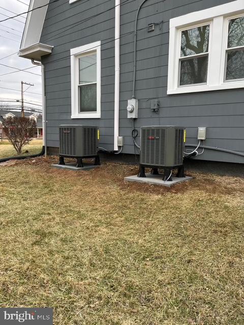 17035 Virginia Ave, Williamsport, MD 21795 - view of home's exterior featuring a yard and central AC