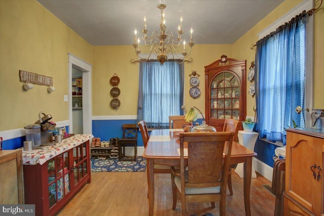 17035 Virginia Ave, Williamsport, MD 21795 - dining room with a chandelier and light wood-type flooring
