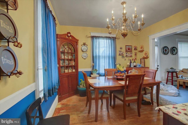 17035 Virginia Ave, Williamsport, MD 21795 - dining area with wood finished floors and an inviting chandelier