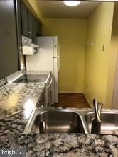 kitchen featuring range with electric cooktop