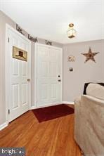 foyer with wood finished floors