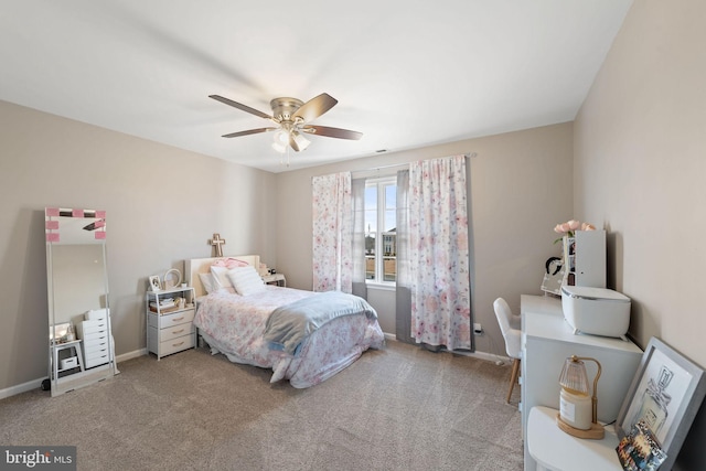 bedroom with carpet floors, ceiling fan, and baseboards