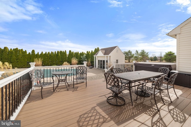 wooden terrace with outdoor dining area, an outdoor structure, an outdoor pool, an exterior structure, and a hot tub