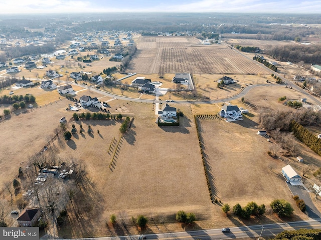 birds eye view of property featuring a rural view