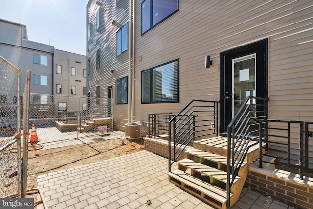 view of patio / terrace featuring fence