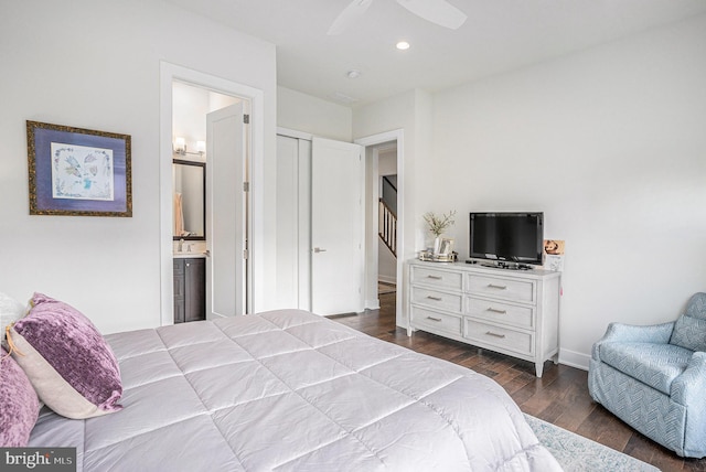 bedroom with baseboards, dark wood-style floors, ceiling fan, ensuite bathroom, and recessed lighting