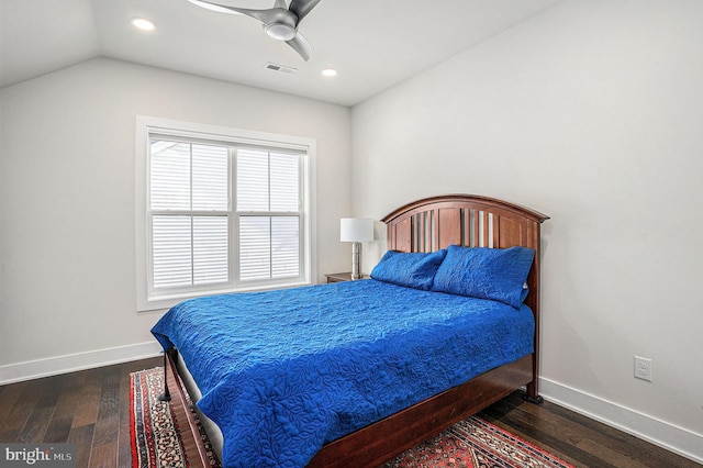 bedroom with dark wood-style flooring, visible vents, and baseboards