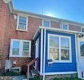 view of front of home featuring brick siding