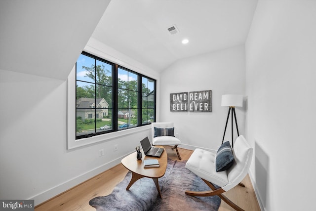 6807 29th St N, Arlington, VA 22213 - sitting room featuring lofted ceiling, wood finished floors, and recessed lighting